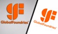 December 14, 2021, Brazil. In this photo illustration the GlobalFoundries logo seen displayed on a smartphone and on the