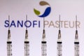 December 4, 2020, Brazil. In this photo illustration various medical syringes is seen with Sanofi Pasteur company logo displayed