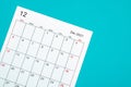 December 2021 calendar sheet on green background Royalty Free Stock Photo