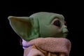 DECEMBER 2020: The Child or baby Yoda, fictional character from the TV series The Mandalorian Royalty Free Stock Photo