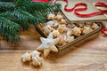 December is Christmas time.Christmas cookies with tree branches and decorations for the Christmas tree - snowflak.Winter holiday.