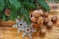 December is Christmas time.Walnuts ceramic glass, tree branches and decorations for the Christmas tree-snowflakes.Winter holiday.