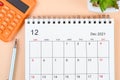 December 2021 desk calendar with calculator Royalty Free Stock Photo