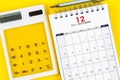 December 2021 desk calendar with calculator Royalty Free Stock Photo