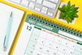 December 2021 desk calendar and diary with keyboard computer Royalty Free Stock Photo