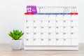 December 2021 desk calendar with plant in pot Royalty Free Stock Photo