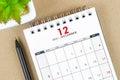 December 2021 desk calendar on wooden Royalty Free Stock Photo