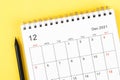 December 2021 desk calendar on yellow background Royalty Free Stock Photo