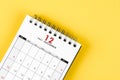 December 2021 desk calendar on yellow background Royalty Free Stock Photo