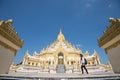 15 December 2016 Female tourist walking at Swe Taw Myat, Buddha Tooth Relic Pagoda a famous and beautiful buddhist temple in