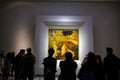 December 2021 Florence, Italy: Uffizi Gallery inside, visitors watching Leonardo da Vinci`s painting