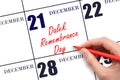December 21. Hand writing text Dalek Remembrance Day on calendar date. Save the date.