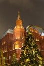 December 21, 2018. Historical Museum on the Red Square of Moscow New Year`s fair, decorated with a bright Christmas tree