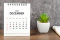 The December 2023 Monthly desk calendar for 2023 with diary on wooden table Royalty Free Stock Photo