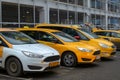 December 13, Moscow, Russia-row of yellow cars Yandex taxi Royalty Free Stock Photo