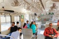 December 21 2022 - Mumbai, Maharashtra, India: Interior of local city train. Rows of steel handrails inside the coach