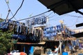 December 21 2022 - Mumbai, Maharashtra, India: People washing clothes in Dhobi Ghat Laundry District, a well known open air Royalty Free Stock Photo