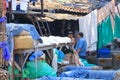 December 21 2022 - Mumbai, Maharashtra, India: People washing clothes in Dhobi Ghat Laundry District, a well known open air Royalty Free Stock Photo