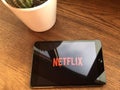 December 2019 Parma, Italy: Netflix company logo icon on tablet screen close-up. Netflix visual brand