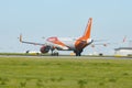 1 December 2022 PORTUGAL, LISBON: EASYJET OE-IJX airplane gaining speed on the runway