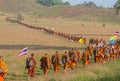 Monk buddhist pilgrimage walking on mountain in thailand