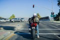 December 6, 2017 San Jose / CA / USA - Motorcyclist waiting at a traffic light, south San Francisco bay area