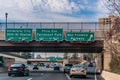 Philadelphia, December, 2018 - Signs with directions to the University City, Phila Zoo, Fairmount Park and Ben Franklin Parkway