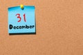 December 31st. Day 31 of month, Calendar on cork notice board. New year at work concept. Winter time. Empty space for Royalty Free Stock Photo