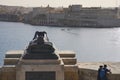 2022 DECEMBER Statue of a known soldier at sea at the Siege Bell Memorial overlooking Fort Saint Angelo in Birgu of the capital of