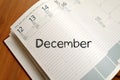 December text concept on notebook