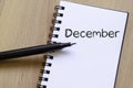 December text concept on notebook