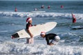 Surfing Santa`s on the beach