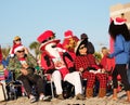 Surfing Santa`s on the beach