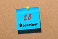 December 28th. Day 28 of month, Calendar on cork notice board. New year at work concept. Empty space for text Royalty Free Stock Photo