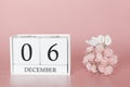 December 06th. Day 6 of month. Calendar cube on modern pink background, concept of bussines and an importent event Royalty Free Stock Photo