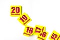 December 20th. Day 20 of month, Calendar date. Many yellow sheet of the calendar. Winter month, day of the year concept