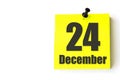 December 24th. Day 24 of month, Calendar date. Yellow sheet of the calendar. Winter month, day of the year concept