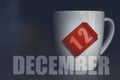 december 12th. Day 12 of month,Tea Cup with date on label from tea bag. winter month, day of the year concept