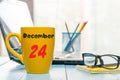 December 24th Eve Christmas. Day 24 of month, calendar on manager workplace background. New year concept. Empty space