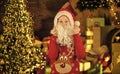 December tradition. Fluffy beard. Child with white long fake beard near christmas tree. Merry christmas. Happy childhood