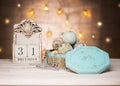 December 31 wooden calendar and vintage New Year balls toys. Royalty Free Stock Photo