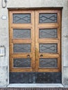 Decent wooden front door with glass fielding. Double wing.