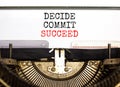 Decide commit succeed symbol. Concept word Decide Commit Succeed typed on beautiful retro old typewriter. Beautiful white paper