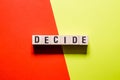 Decide word concept on cubes Royalty Free Stock Photo