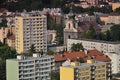 Decin, Czech republic - June 14, 2019: church between panel houses viewed from Pastyrska stena view at summer sunset