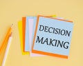 Decision making handwritten on a colofrful sticker. Concept of the action or process of making important decisions Royalty Free Stock Photo