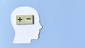 Decision Making and Psychological Evaluation of a situation shown by plus and minus signs inside a human head silhouette, Royalty Free Stock Photo