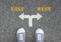 Decision to make at the crossroad - east or west Royalty Free Stock Photo