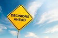 Decisions ahead road sign with blue sky and cloud background Royalty Free Stock Photo