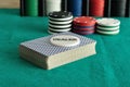 A deck of card with poker chips Royalty Free Stock Photo